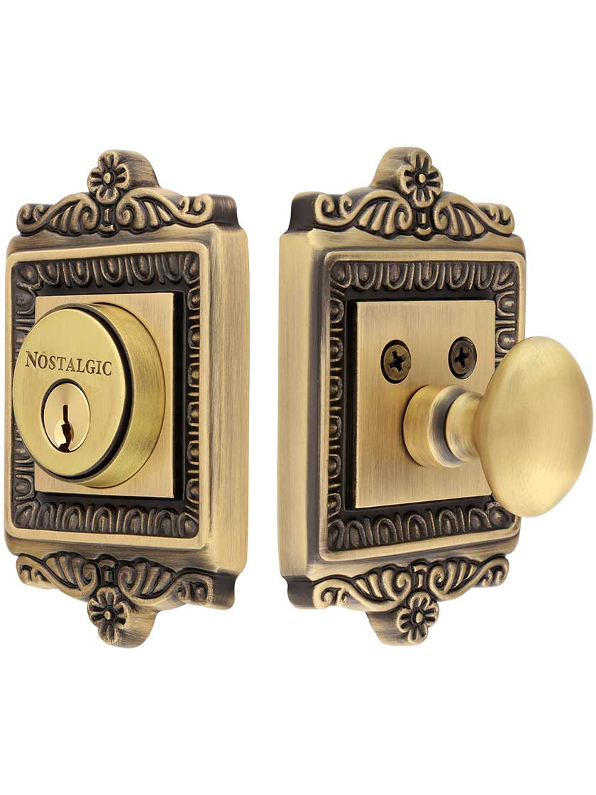 Egg and Dart Style Single-Cylinder Deadbolt Keyed Differently in Antique Brass.